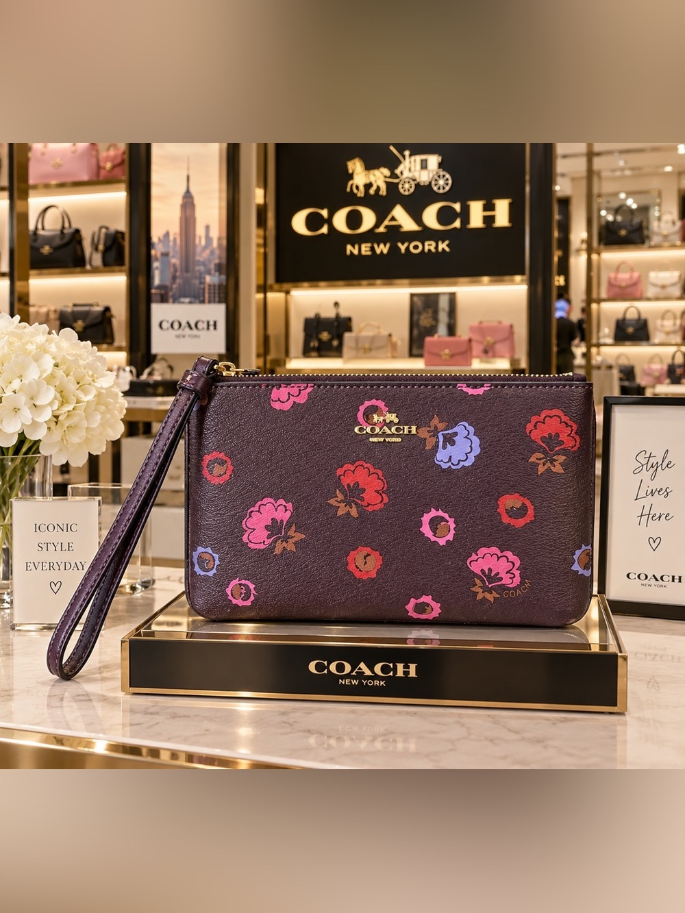 COACH Purple Floral Zip Wristlet with Gold Logo